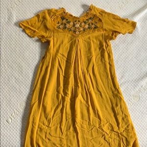 FRANCESCA’s mustard colored midi dress